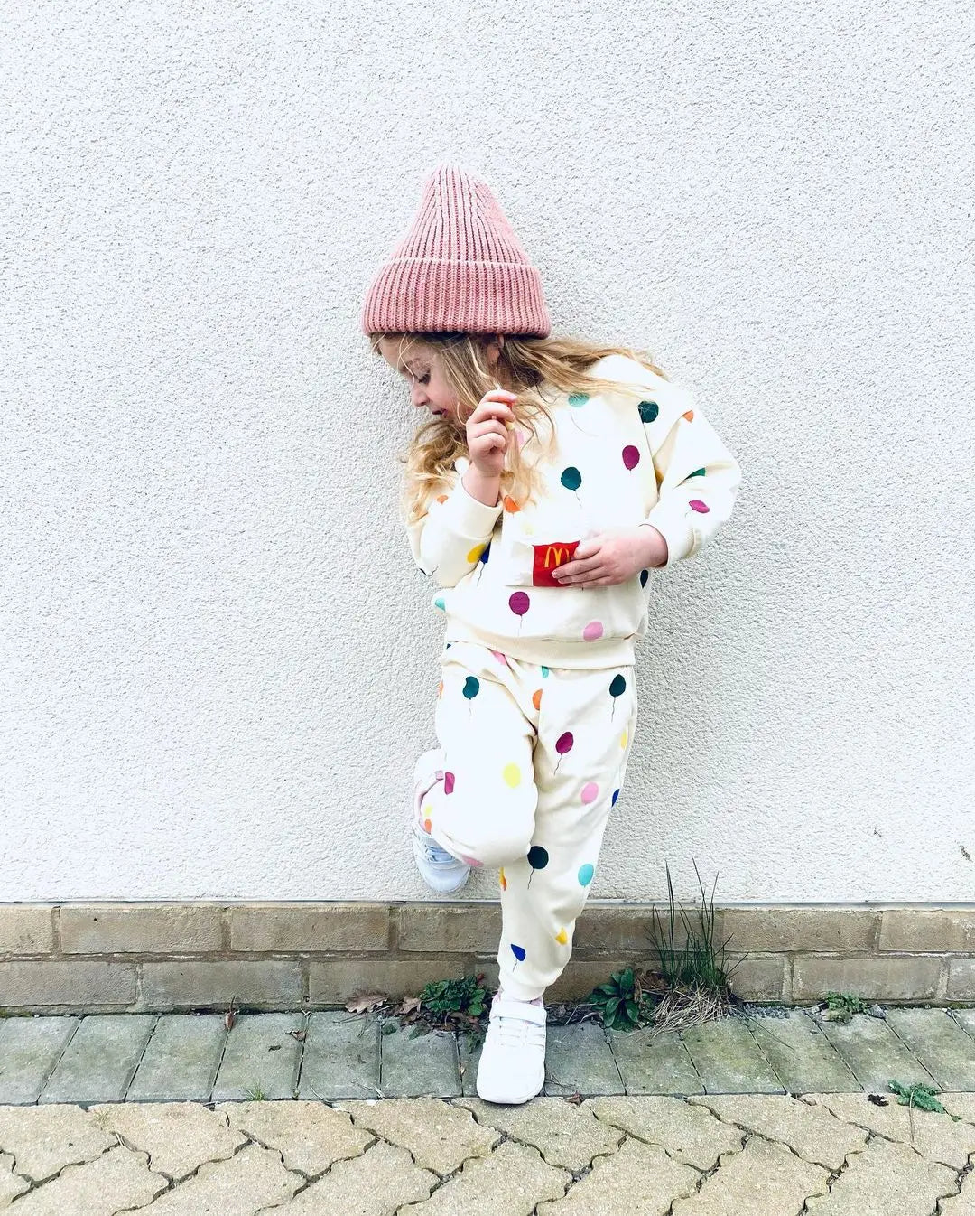 Toddler in Balloon Print Outfit